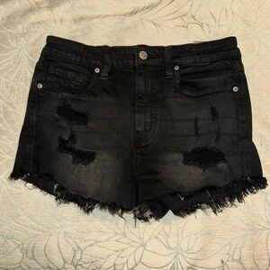 Black pair of jean shorts